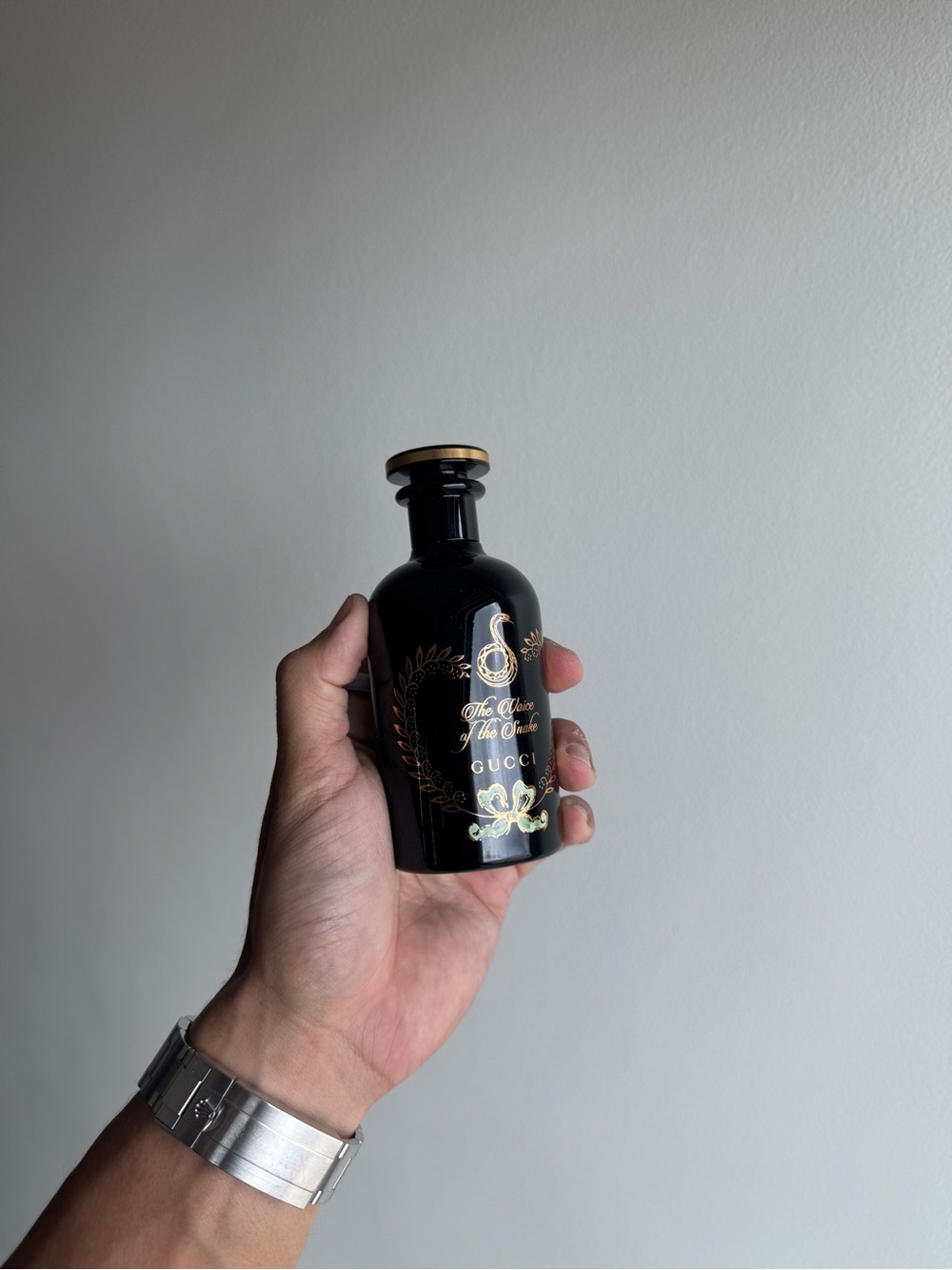 Gucci Black Bottle with Gold Accents